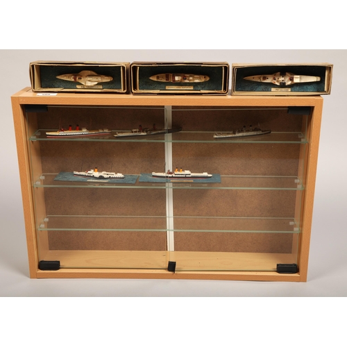 508 - Quantity of small vintage  model boats in modern display case