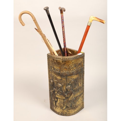 531 - Corner brass umbrella stand, silver topped swagger stick, Horn shoe horn and other sticks (6)