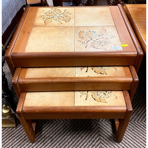 576 - Nest of three table with vintage tiles on top, largest 43 cm high