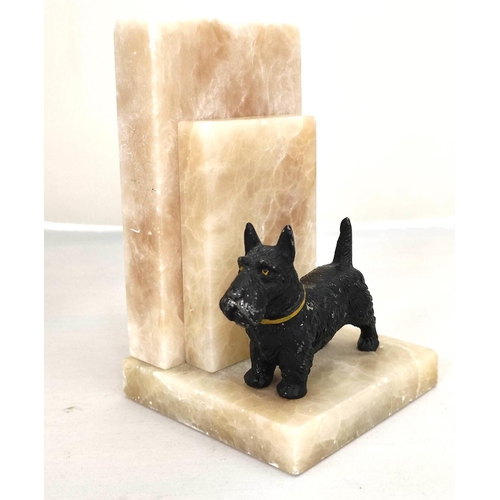 365 - Pair of Art Deco alabaster book ends with cold painted spelter Scottish Terrier figures.18 cm high.