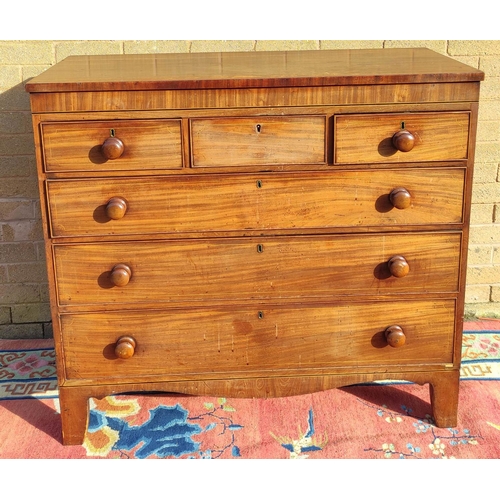 409 - Early 19th century mahogany chest of drawers with three small drawers above three long graduated dra... 