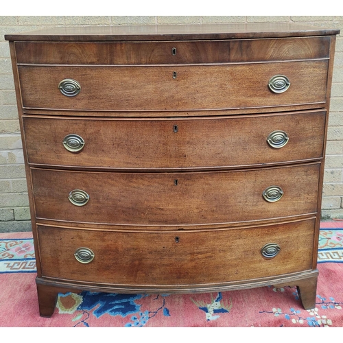 413 - Early 19th century mahogany bow front chest of  four graduated drawers on bracket feet.  110cm high,... 