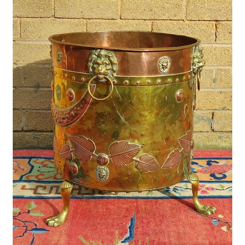 416 - Late Victorian brass and copper jardiniere decorated with beaten roundels and all over chased leaf, ... 