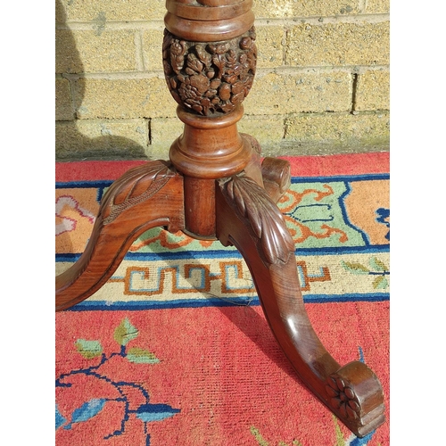 422 - 19th century mahogany tripod table with dished top, on carved baluster column and scroll tripodsuppo... 