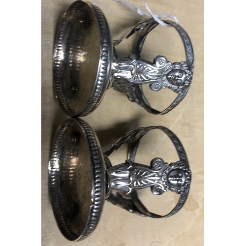 212 - Pair of silver egg cups.