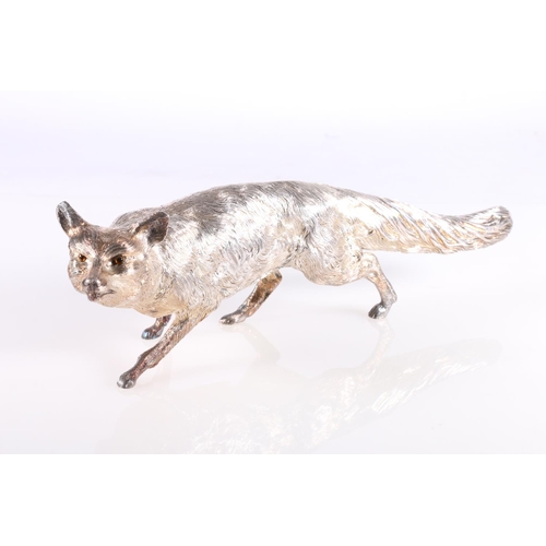 23 - Hollow silver table model of a fox, probably by C J Vander Ltd, 32cm long, 890g gross.