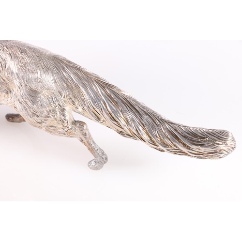 23 - Hollow silver table model of a fox, probably by C J Vander Ltd, 32cm long, 890g gross.