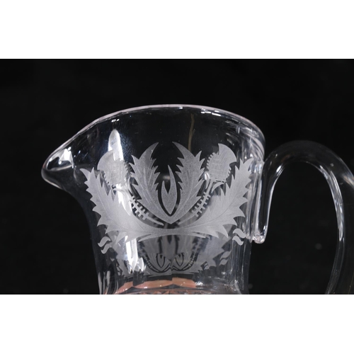 397 - Graduated set of three Edinburgh Crystal thistle pattern jugs of thistle shape with hobnail cut bodi... 