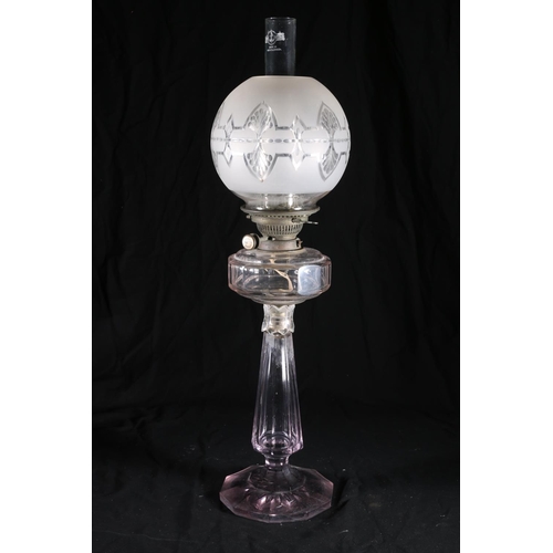 401 - Antique glass oil lamp having amethyst hued glass base and reservoir, with Hinks's No2 Duplex wick w... 