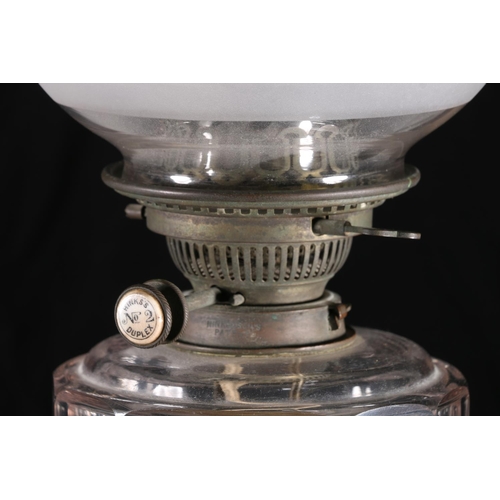 401 - Antique glass oil lamp having amethyst hued glass base and reservoir, with Hinks's No2 Duplex wick w... 