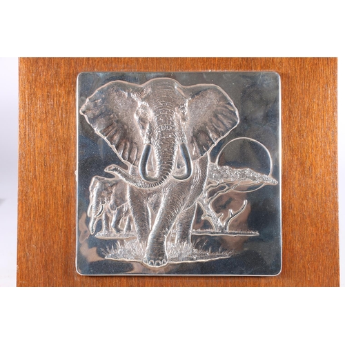 17 - Anthony Jones, The Lord of the Serengeti silver panels, The Leopard and The Elephant, dated 1978, mo... 