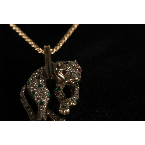 172 - 14ct yellow gold panther pendant set with diamonds, rubies and Columbian emeralds, 7g, on Italian 14... 