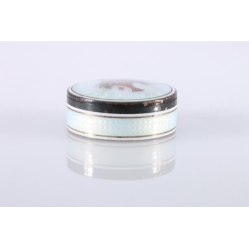 27 - Continental silver and guilloche enamel circular pill box, the hinge top decorated with basket of fl... 