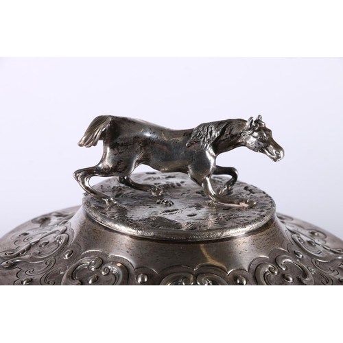 35 - Victorian silver prize cup and cover, the lid with horse finial, raised on stem with four masks, mak... 