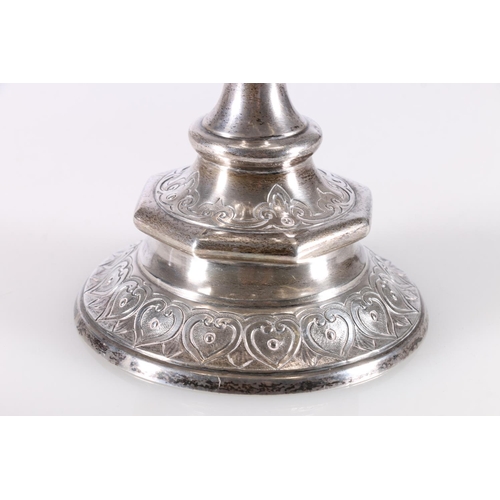 35 - Victorian silver prize cup and cover, the lid with horse finial, raised on stem with four masks, mak... 