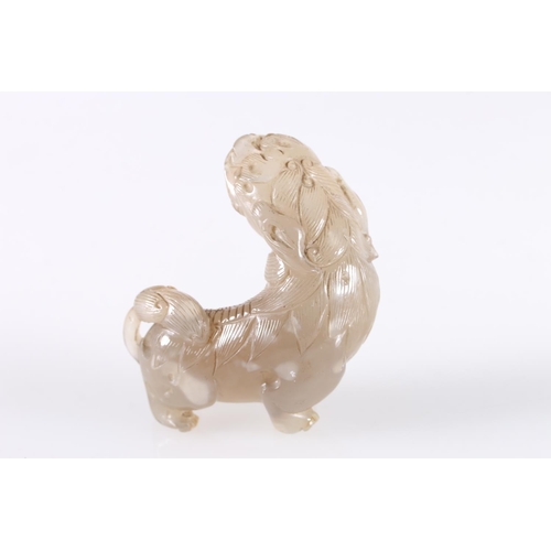 483 - Chinese jade carving of a lion dog, unsigned, 7cm tall, 7cm long. 