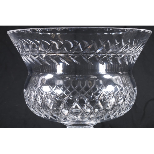 399 - Large lead crystal cut glass centrepiece vase of thistle form with cut decoration, raised on bulbous... 