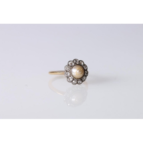 193 - 18t gold dress ring set with central baroque pearl encircled by 11 round cut diamonds, ring size M, ... 