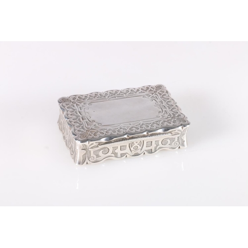 42 - Victorian antique silver snuff box of rectangular shape with scroll edge, the body with engraved dec... 