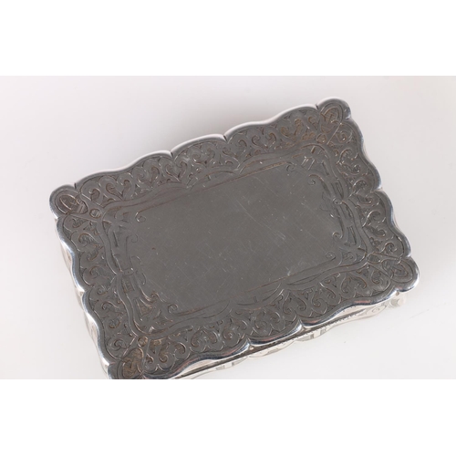 42 - Victorian antique silver snuff box of rectangular shape with scroll edge, the body with engraved dec... 