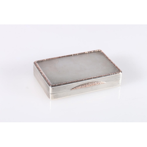 59 - Art Deco parcel gilt silver snuff box of rectangular shape having all over engine turned decoration,... 