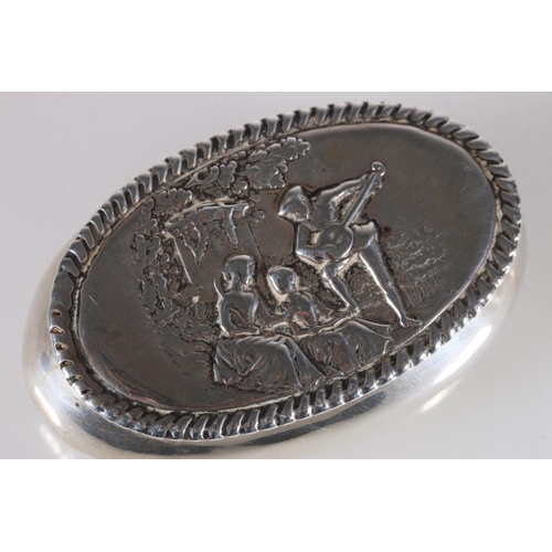 63 - Victorian antique silver snuff box of oval shape, the lid decorated in repousse with scene of a gent... 