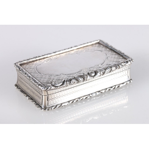 66 - Victorian antique parcel gilt silver snuff box of rectangular form, the engine turned body with reli... 