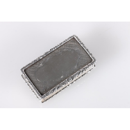 66 - Victorian antique parcel gilt silver snuff box of rectangular form, the engine turned body with reli... 