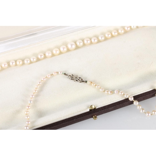 196 - Single strand graduated pearl necklace with 9ct white gold closure set with small diamond, 57cm long... 