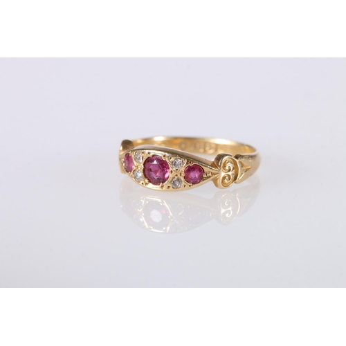 197 - 18ct gold gem set dress ring set with rubies and diamonds, ring size O, 3.9g.