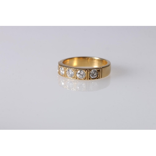 200 - Unhallmarked yellow metal dress ring set with five 0.2ct diamonds, ring size L/M, 5.4g gross.