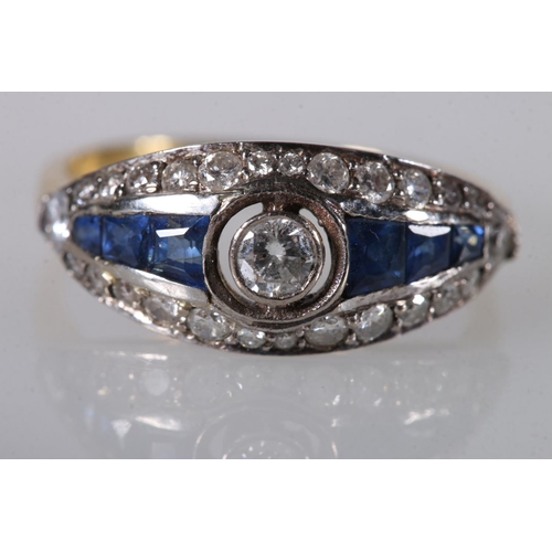 204 - 18ct gold sapphire and diamond dress ring, the central 0.125ct collet set diamond surrounds by gradu... 