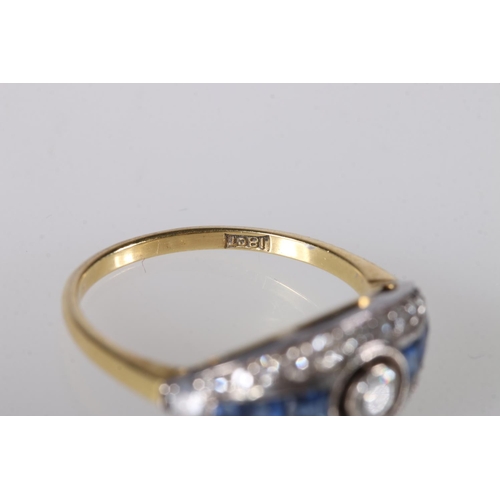 204 - 18ct gold sapphire and diamond dress ring, the central 0.125ct collet set diamond surrounds by gradu... 