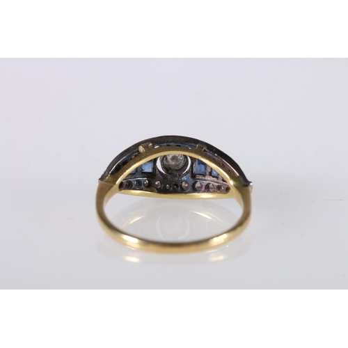 204 - 18ct gold sapphire and diamond dress ring, the central 0.125ct collet set diamond surrounds by gradu... 