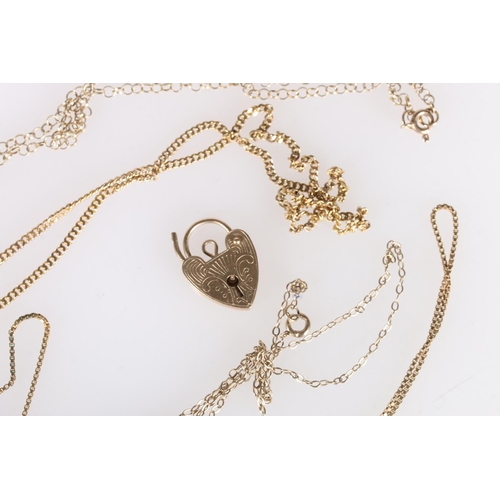 206 - Four 9ct gold neck chains and a 9ct gold heart shaped pendant locket, 12.4g gross. 