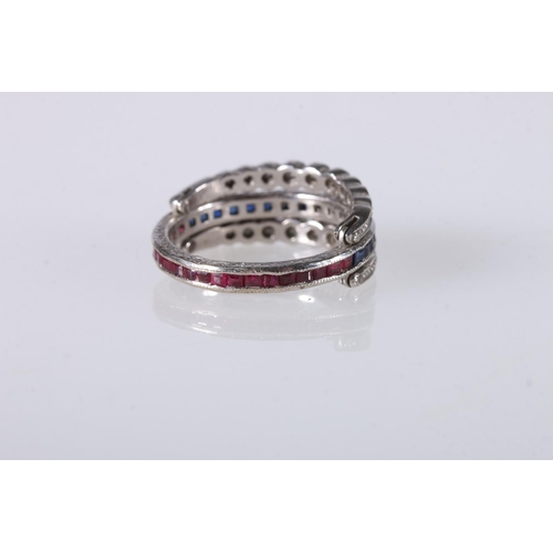 210 - Unhallmarked white metal, likely platinum dress ring, the central band with square faceted sapphire ... 