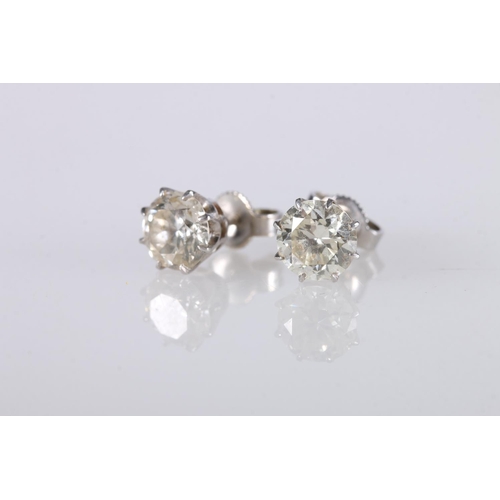 215 - Pair of white metal and diamond ear studs, each set with 1ct diamonds, 14kt white gold butterflies, ... 