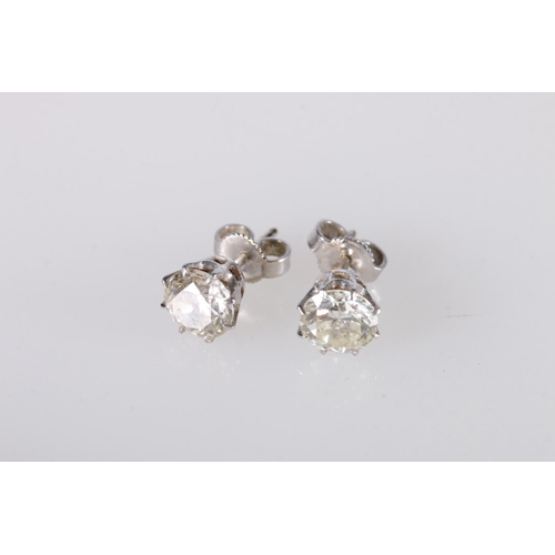 215 - Pair of white metal and diamond ear studs, each set with 1ct diamonds, 14kt white gold butterflies, ... 