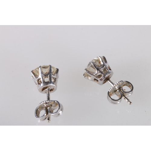 215 - Pair of white metal and diamond ear studs, each set with 1ct diamonds, 14kt white gold butterflies, ... 