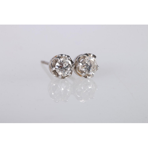 217 - Pair of white metal diamond ear studs, the diamonds approximately 0.25cts, 1.2g gross. 