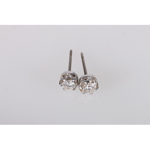 217 - Pair of white metal diamond ear studs, the diamonds approximately 0.25cts, 1.2g gross. 