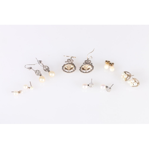 220 - Pair of white metal earrings set with large pearl and small diamonds, 2.2g gross, also five other pa... 