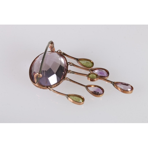 230 - Antique yellow metal mounted amethyst and peridot pendant brooch, the large faceted oval pale amethy... 