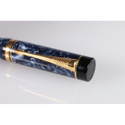 232 - Parker duo-fold fountain pen in blue marbled plastic case and 18kt gold nib.