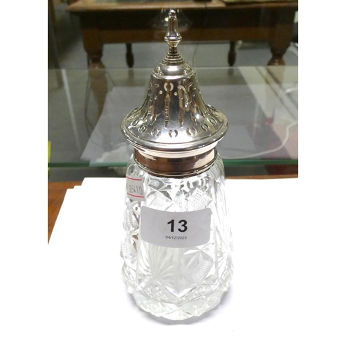 13 - Silver topped cut glass sugar castor.