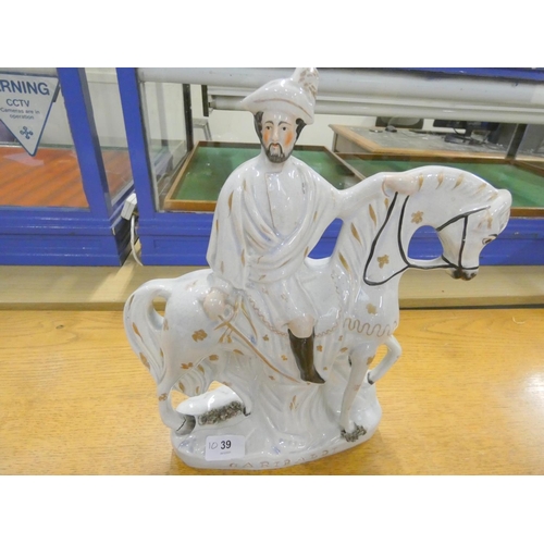 39 - 19th century Staffordshire flat back figure of Garibaldi on horseback.