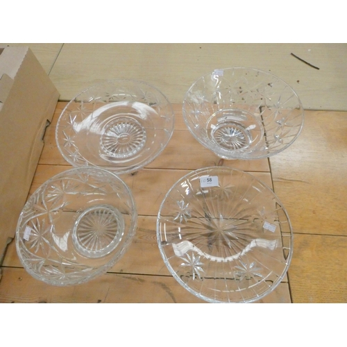 58 - Four large cut glass bowls.