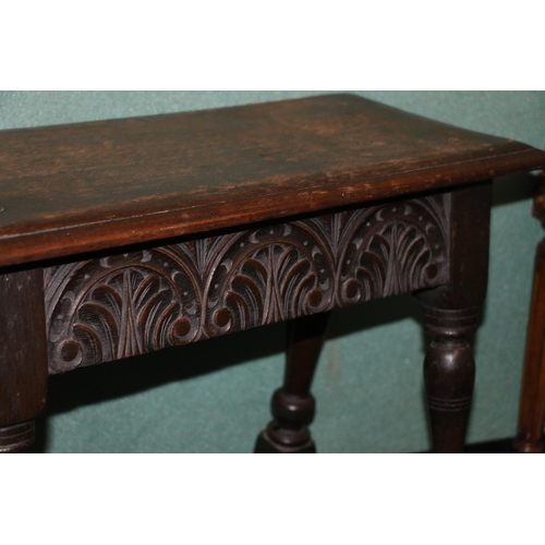 496 - Antique joint stool, the rectangular top with moulded edge above carved C scroll frieze, raised on f... 