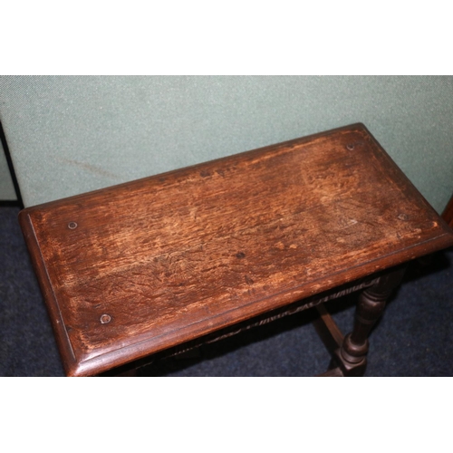 496 - Antique joint stool, the rectangular top with moulded edge above carved C scroll frieze, raised on f... 