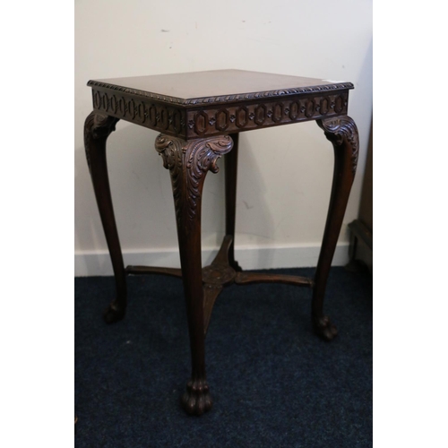 498 - Early 20th century mahogany table in the manner of Gillows, the square top with feather moulded edge... 